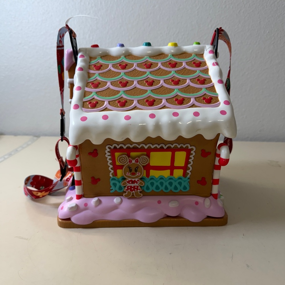Disney Gingerbread House Ornament with Red and White Details
